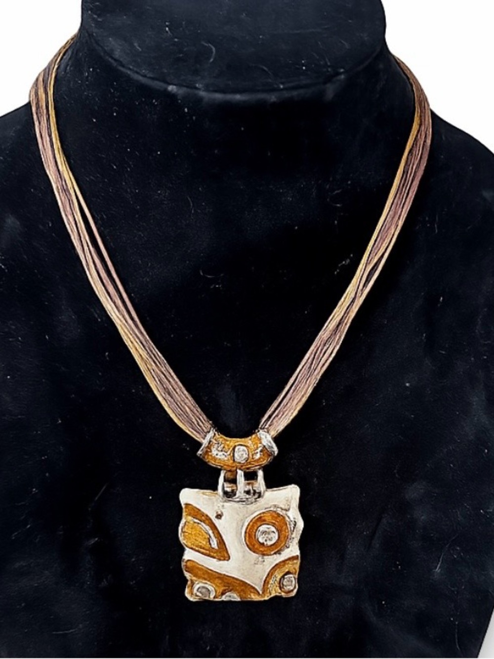 Gaudi Artisan Gold and Silver Pendant Necklace - Multistrand Brown Cord
